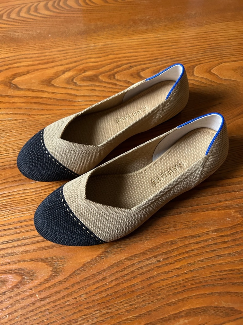 Rothy's “The Flat” Tan with Black Toe Cap and Signature Blue Trim